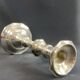 Regency style silver-plated bronze torch candle holder