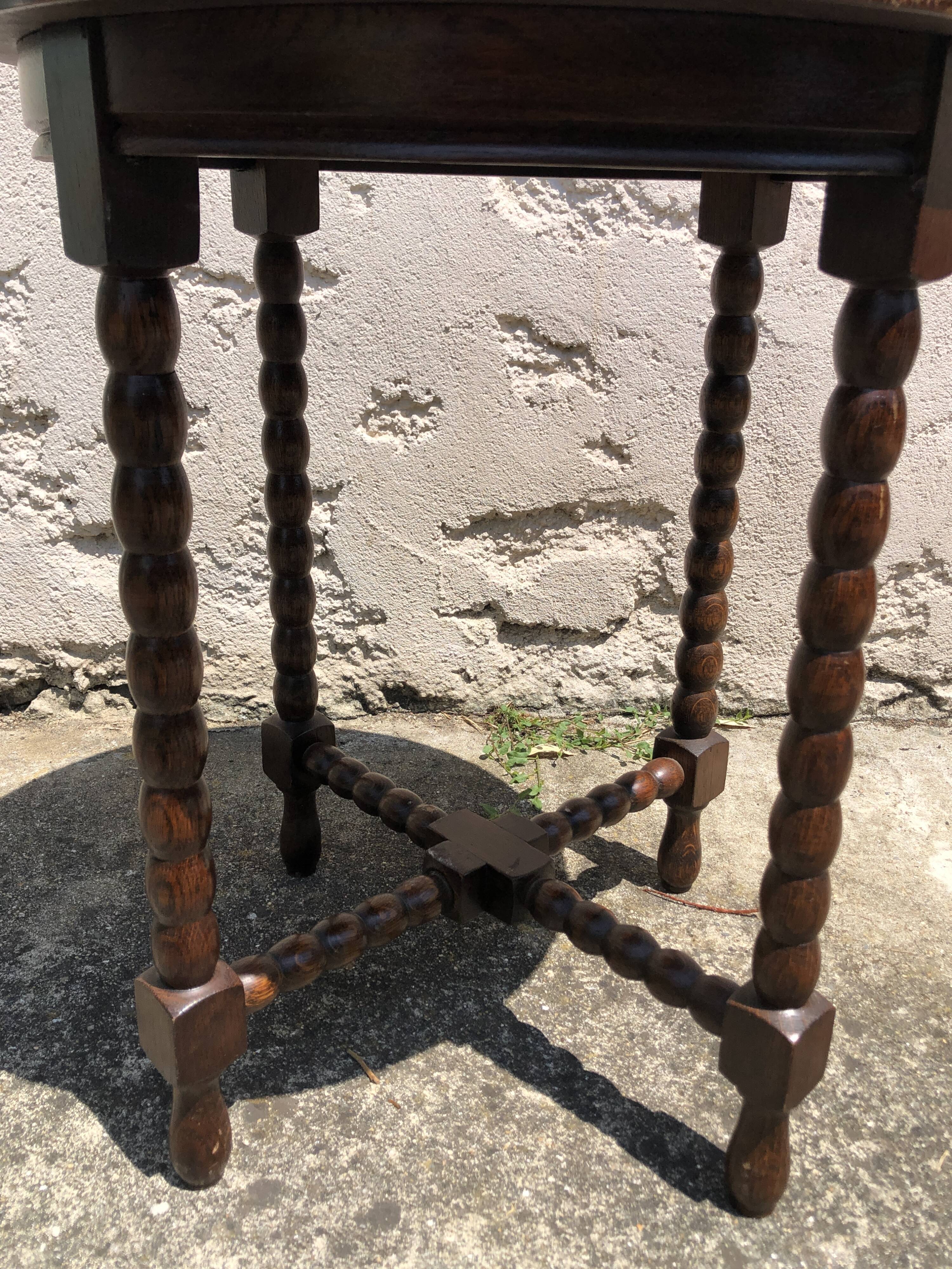 Dark turned wood side table