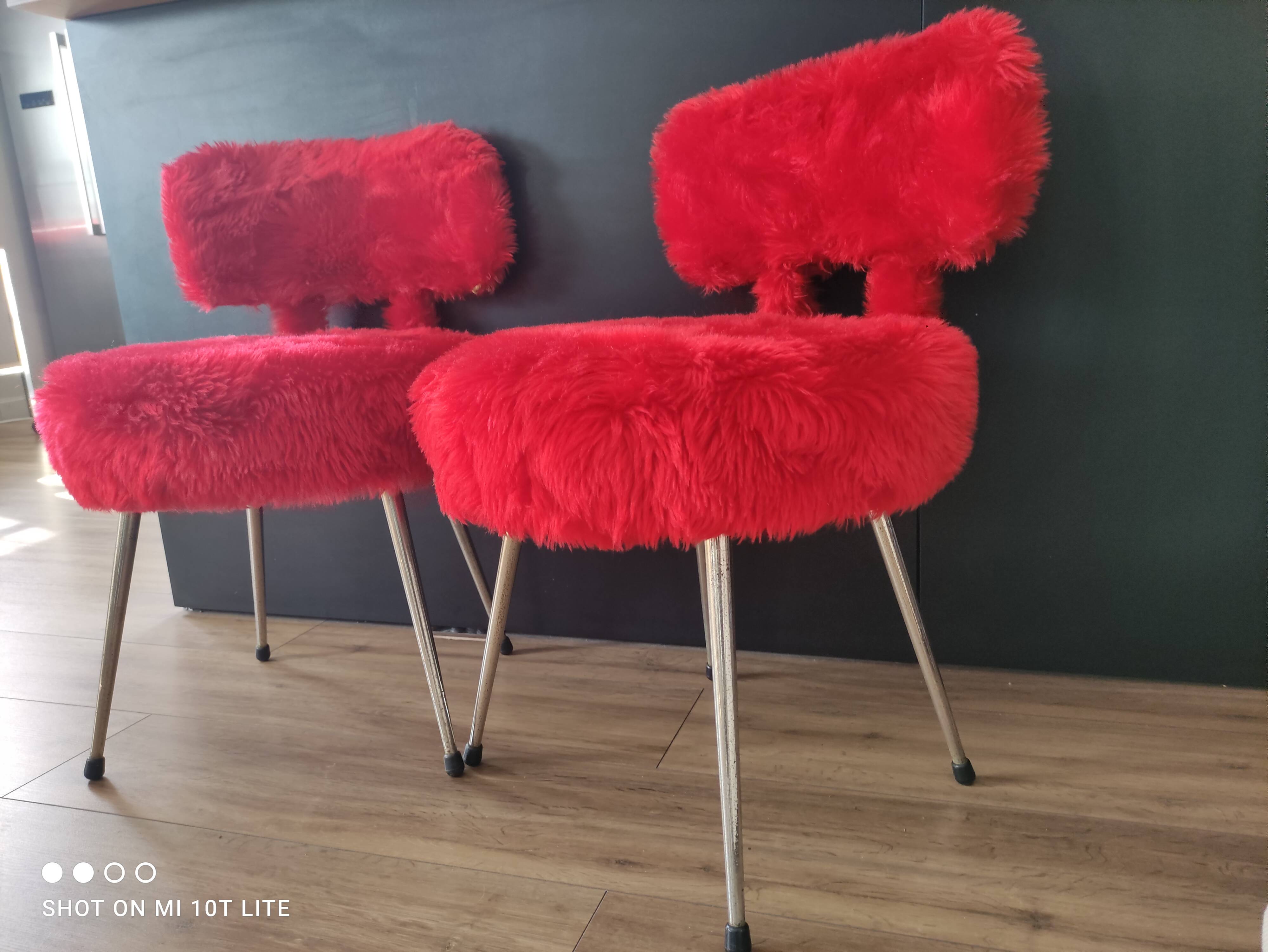 Pair of authentic cardinal red moumoute chairs from the 60s