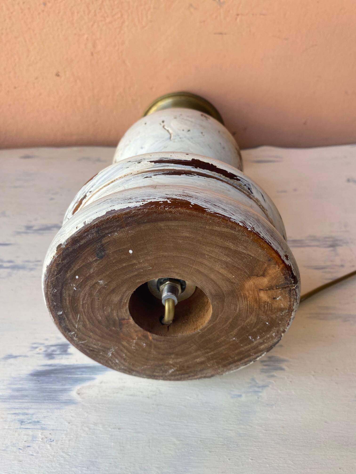 Round lamp base in white patina wood and brass