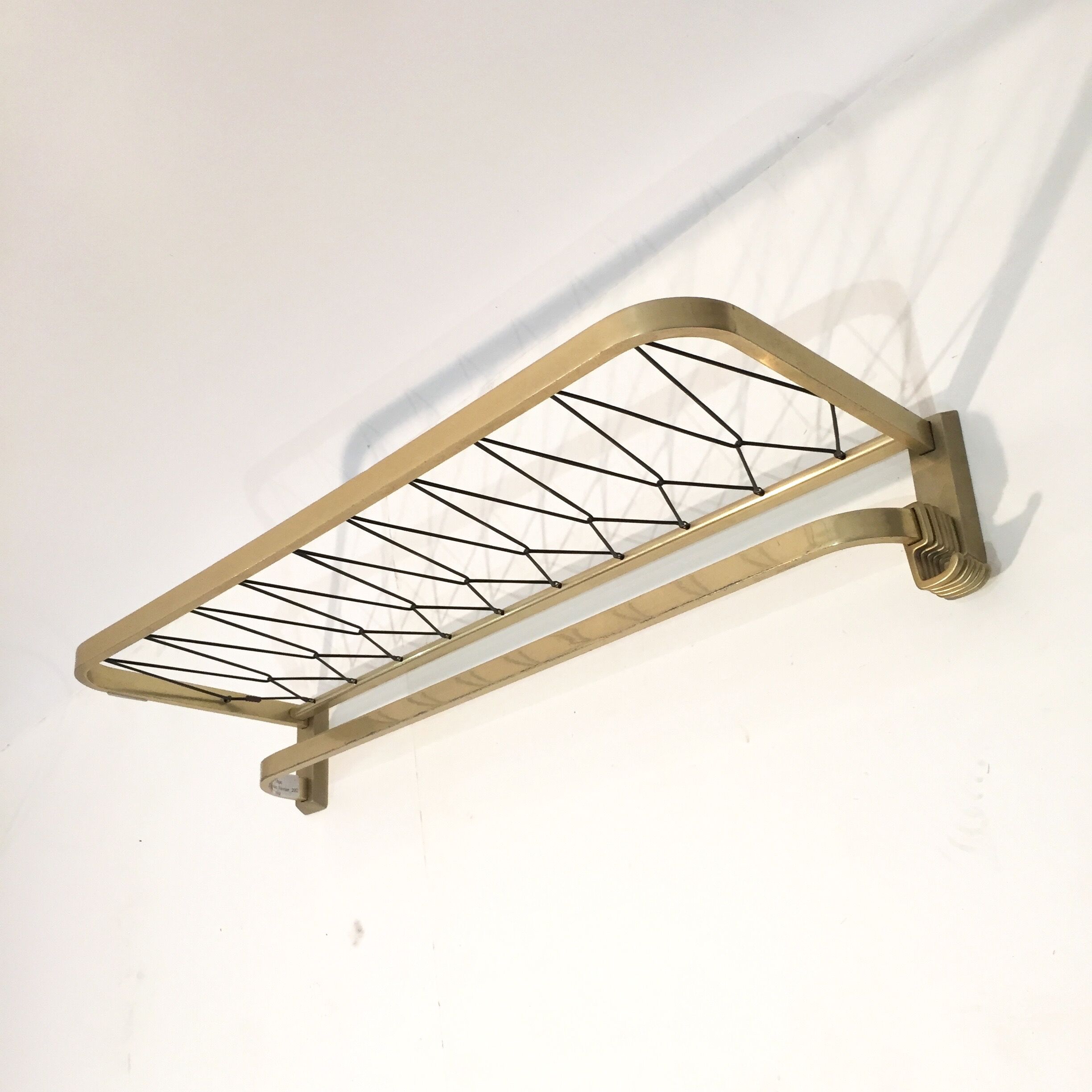 Golden wall coat rack