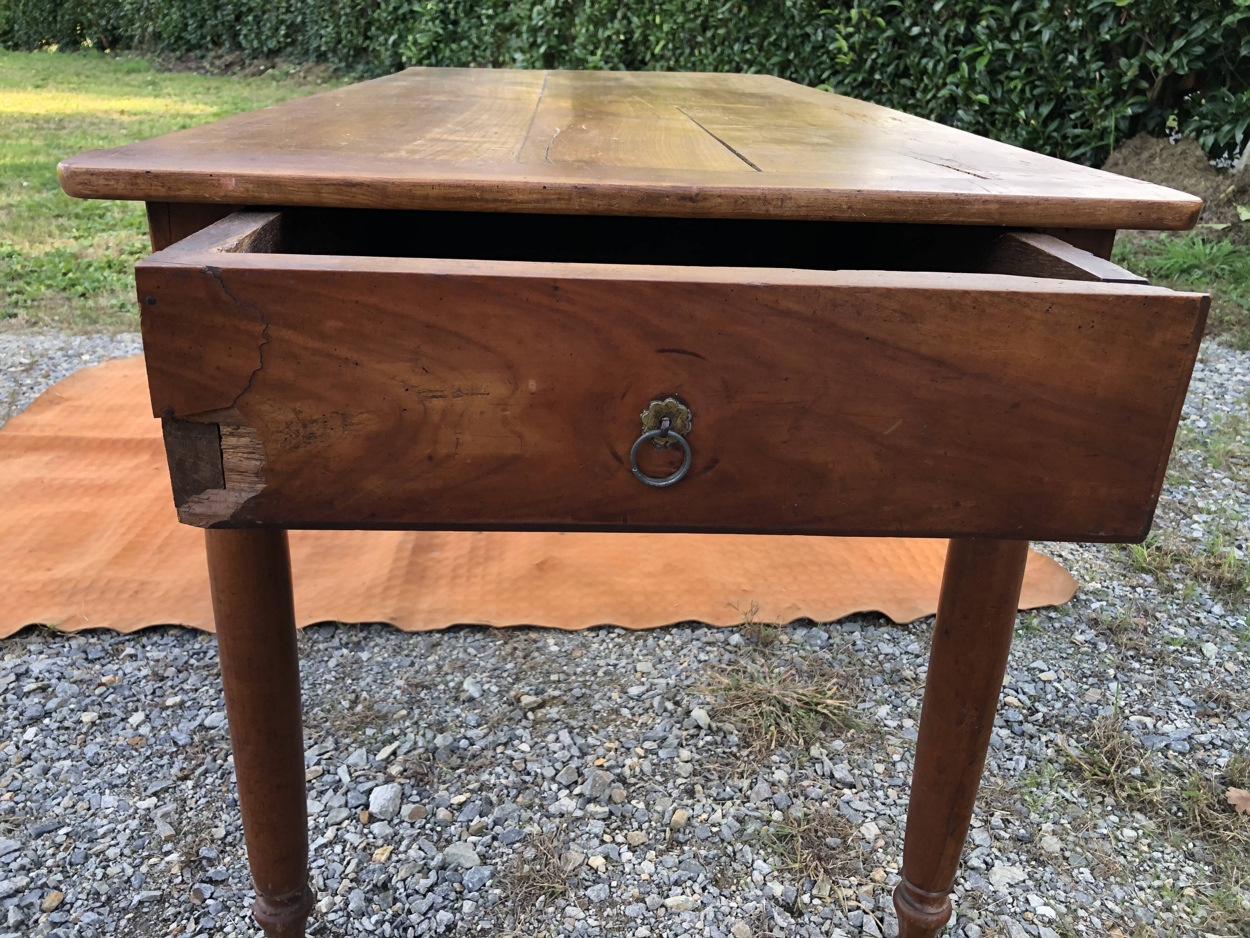 Antique cherry wood farm table with turned base with 2 drawers and 1 pull