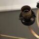 Lustre with 5 branches from the 1960s - 1970s in solid brass and black metal.