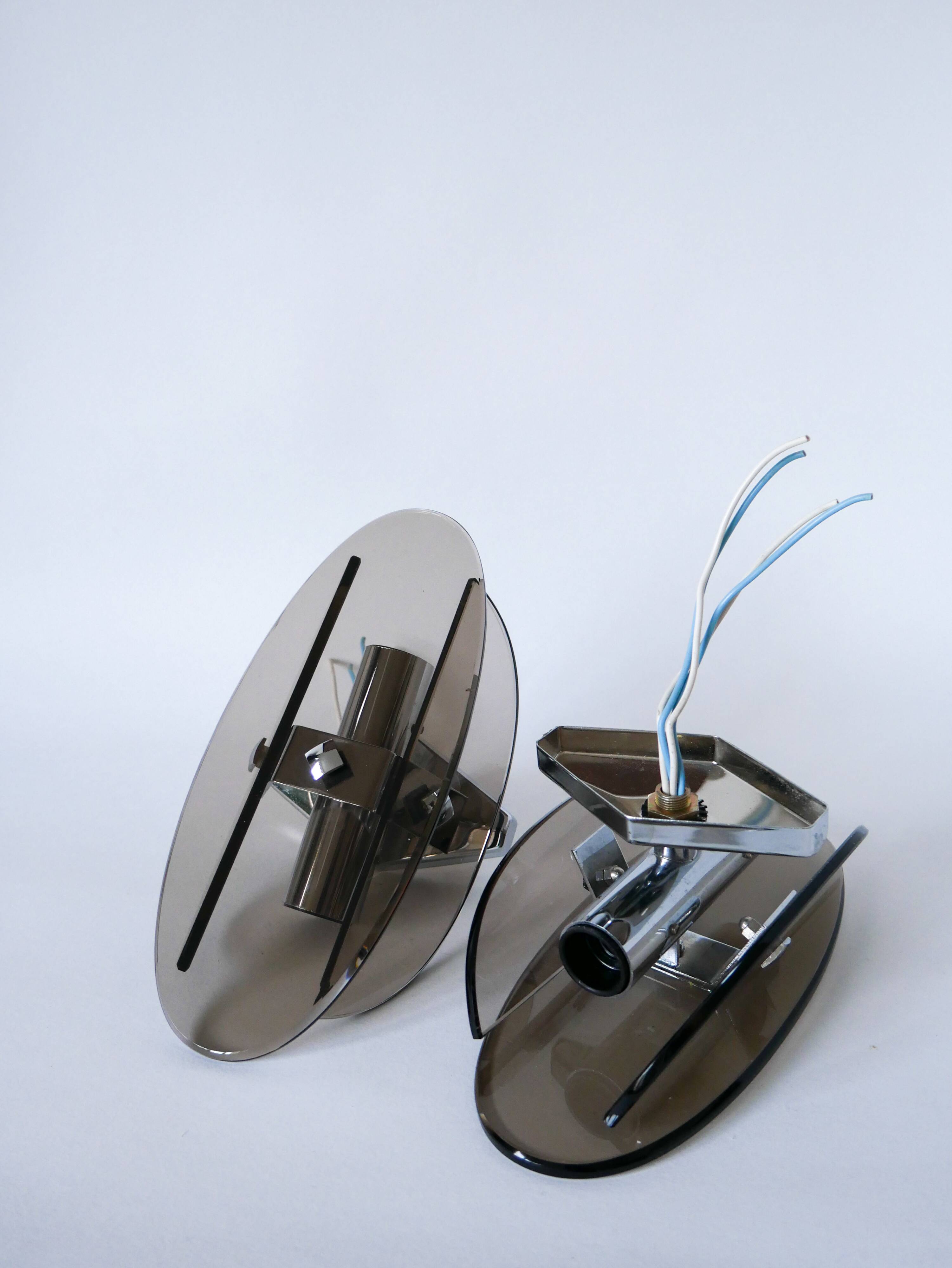 Pair of space age design smoked glass wall lights made in Italy 1970