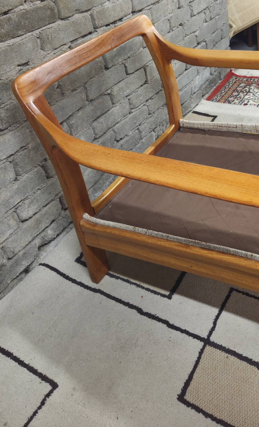 Danish canapé and its 1970s teak armchair