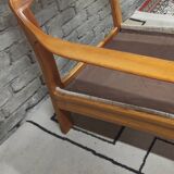 Danish canapé and its 1970s teak armchair