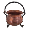 Hammered pedested copper cauldron with wrought iron handle