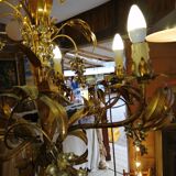 Gilded brass chandelier and silver lily of the valley bells