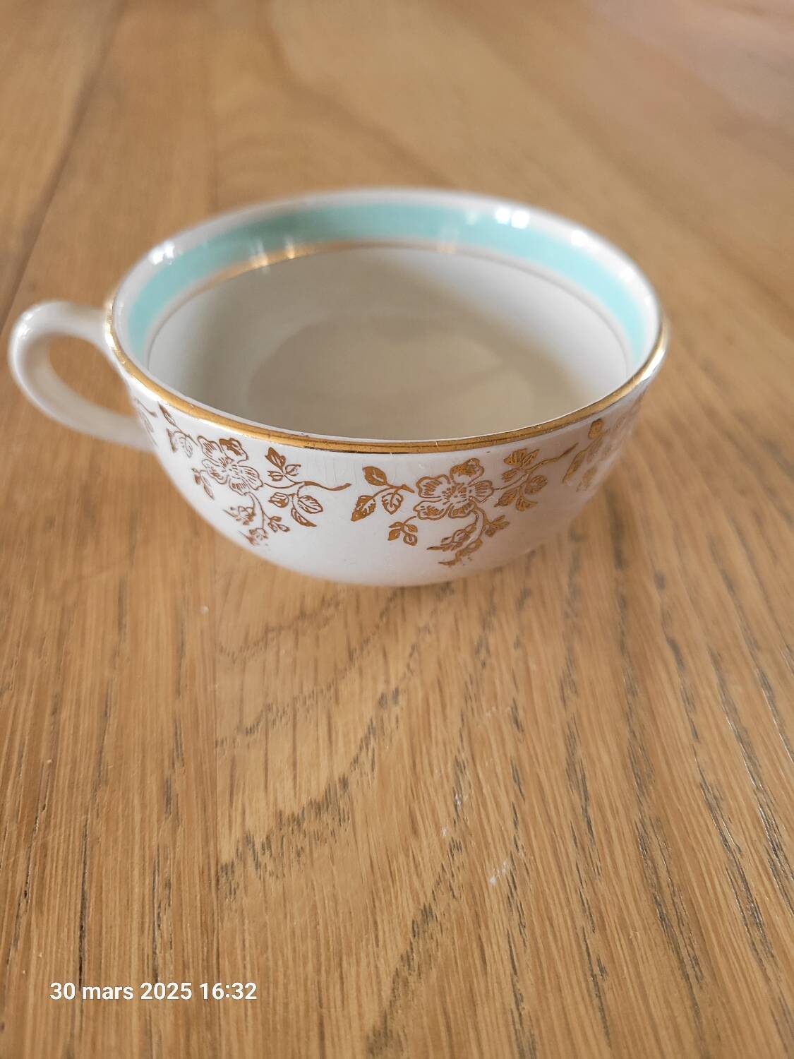 5 antique cups and saucers