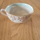 5 antique cups and saucers