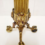 Golden candle holder with lion's head and legs