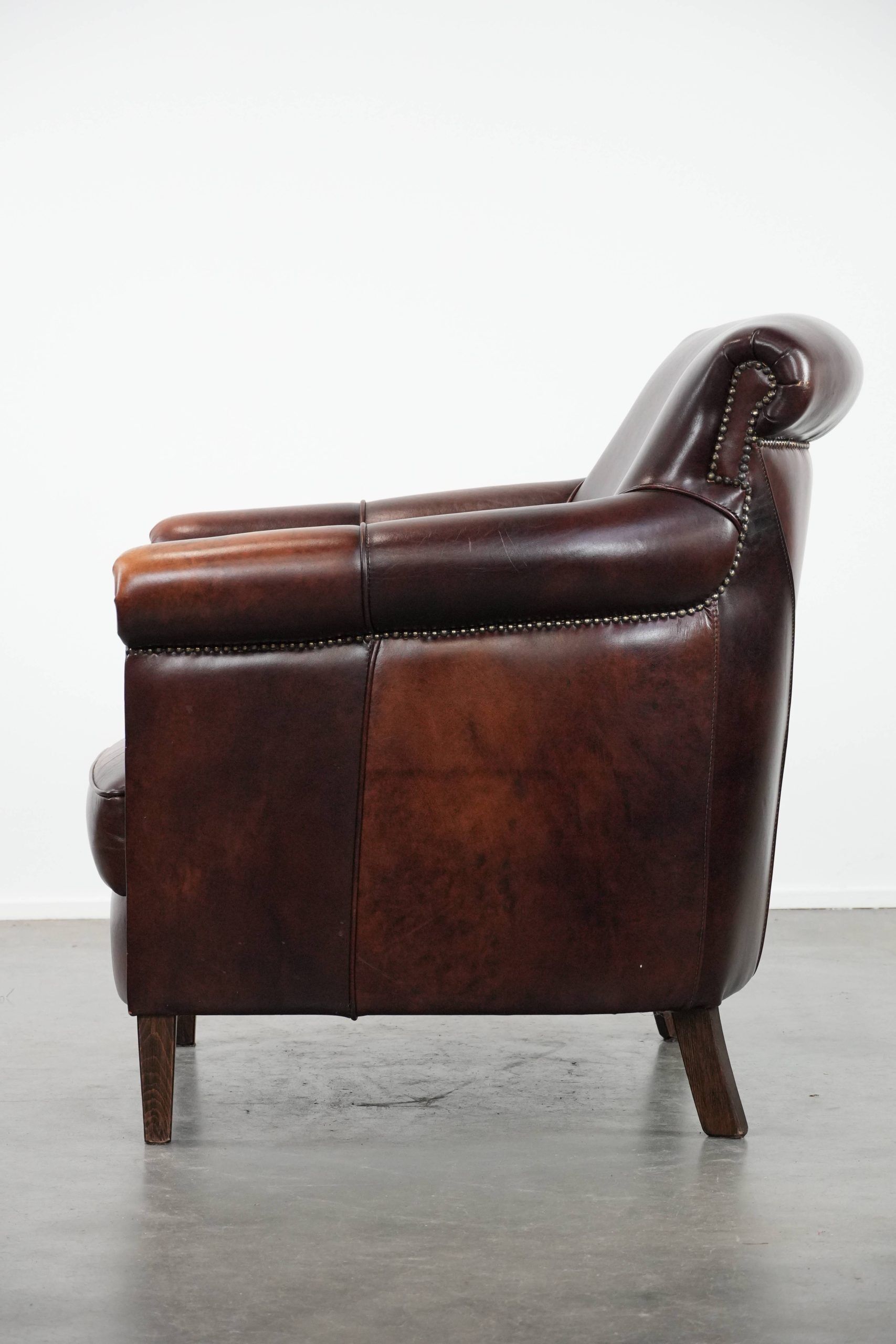 Characterful and comfortable cowhide leather armchair