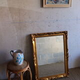 Bevelled gilded wood mirror