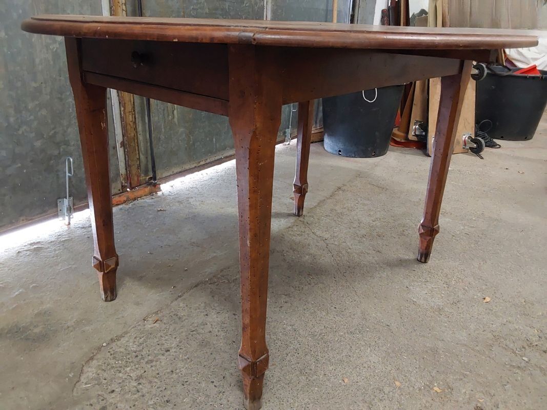 Antique wooden drop-leaf table