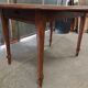 Antique wooden drop-leaf table