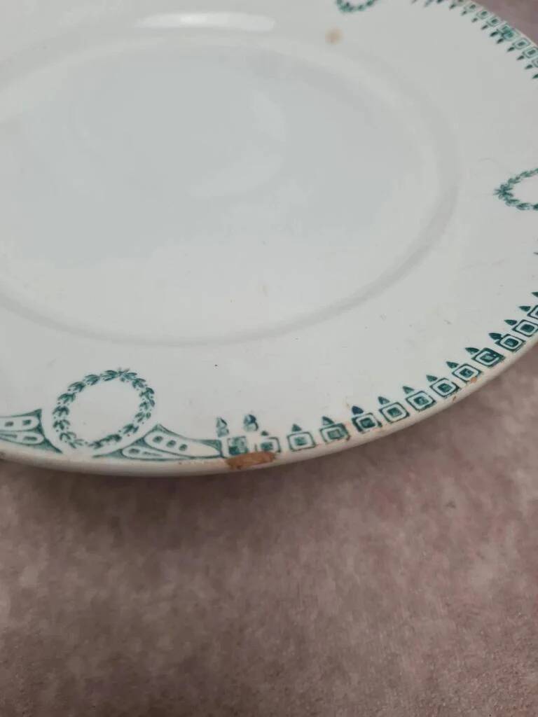 Set of 4 antique plates, Terre de fer Saint-Amand, green decoration.
