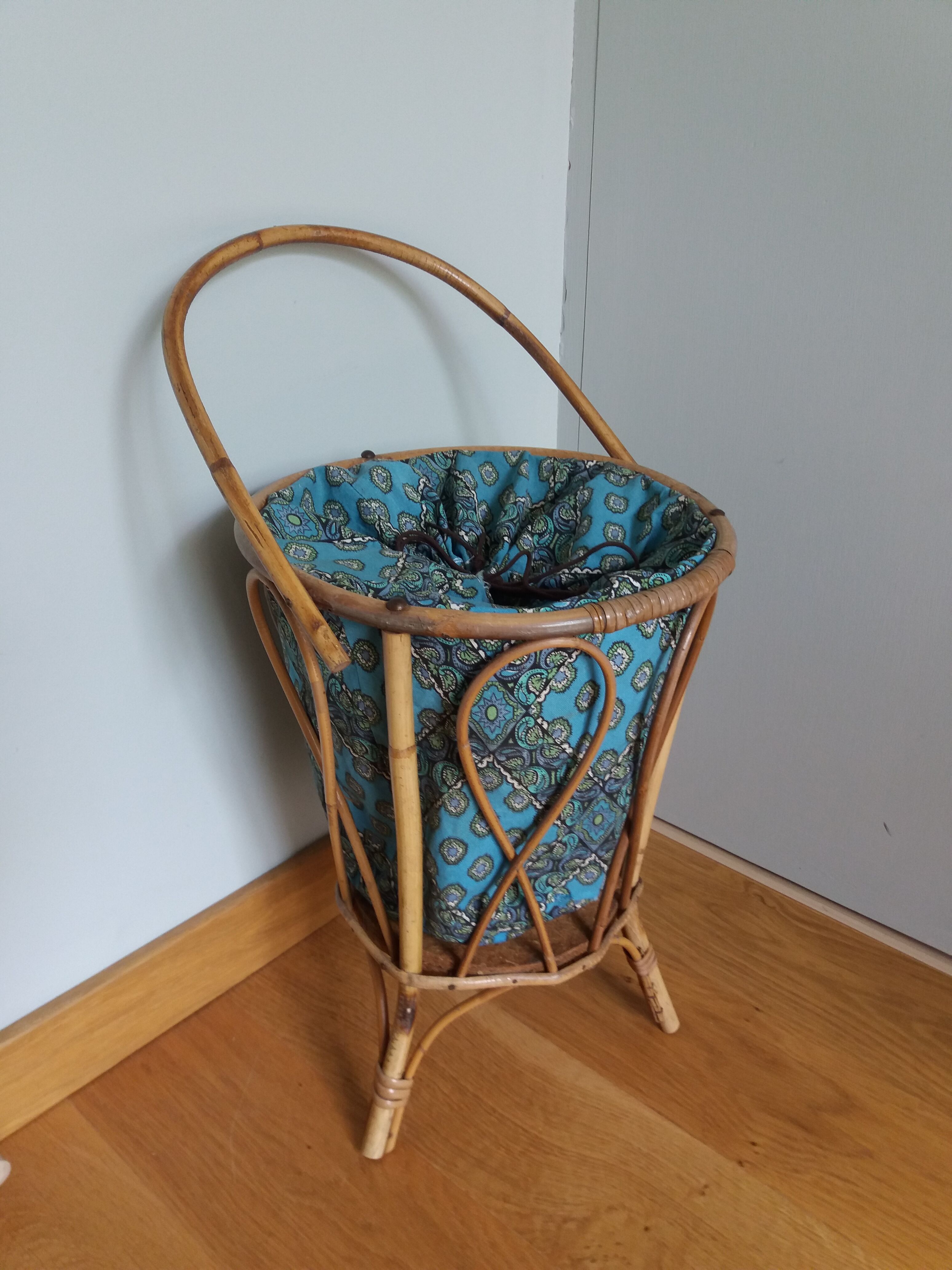 Wicker worker round basket with work, knitting