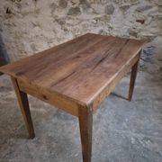 French antique dining table in cherry wood with two drawers, circa 1880–1920.