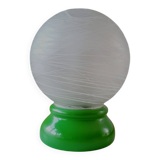Vintage French table lamp with glass opaline shade and wooden green lamp base.