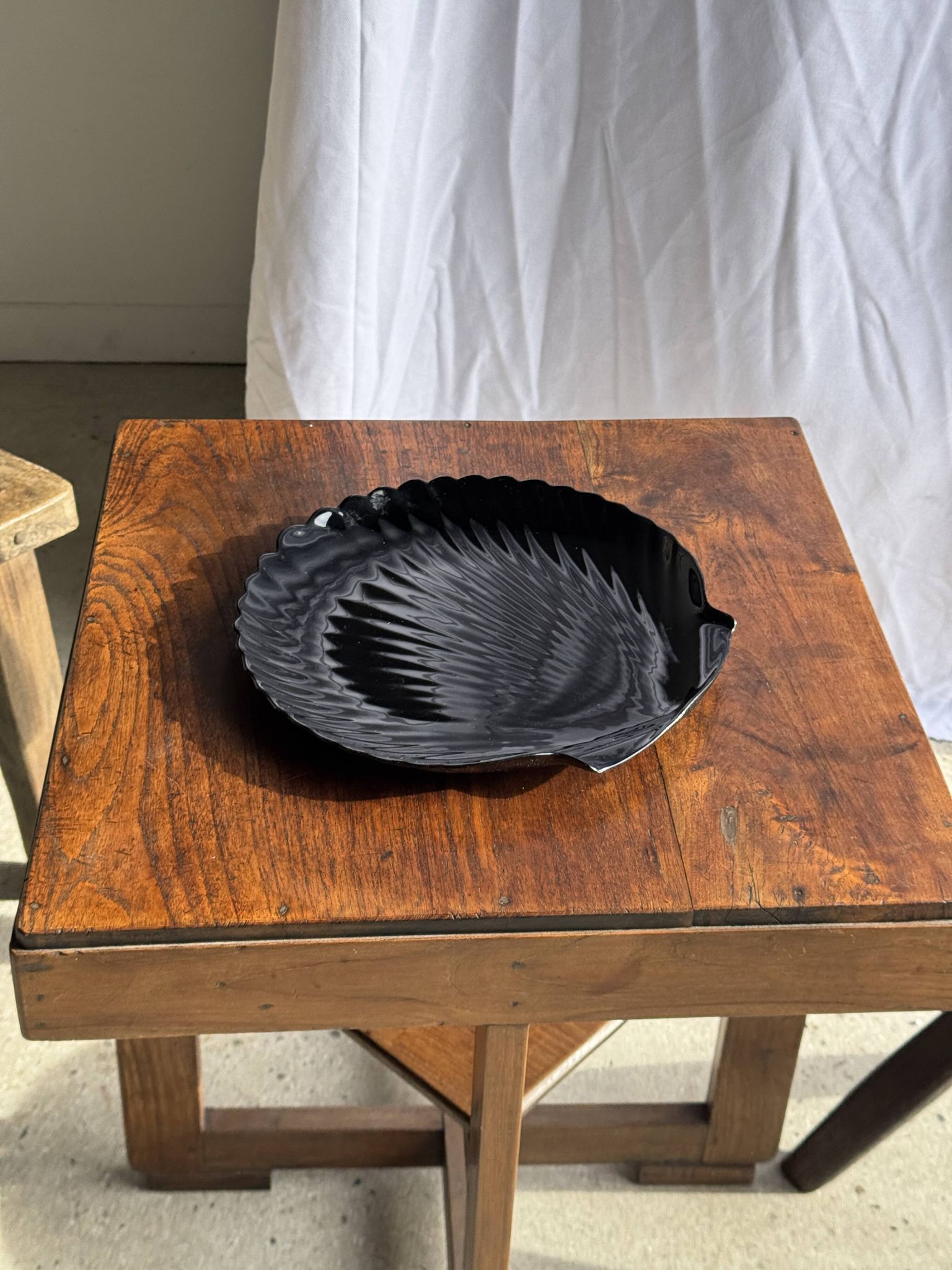Pair of vintage black glass shell dishes D32 and D26