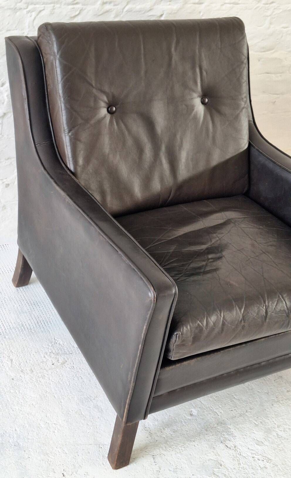 Danish mid century dark brown leather lounge chair, 1960s