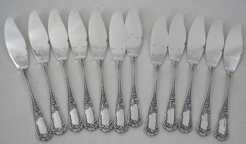 Ercuis Louis XV floral, 12 fish cutlery sets, 24 pieces in silver-plated metal.