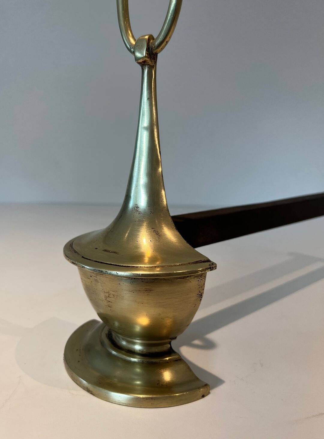 Pair of Bronze Chenets in Neoclassical Style in the Form of an Oil Lamp