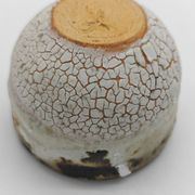 Trilogy of cups or Japanese-style goblets by the Danish ceramist Gutte Eriksen using RAKU technique.