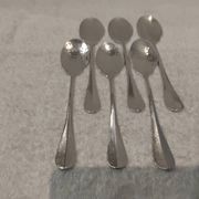 6 individual silver-plated metal sauce spoons with hammered baguette handles
