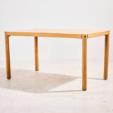 Oak dining table by Lübke