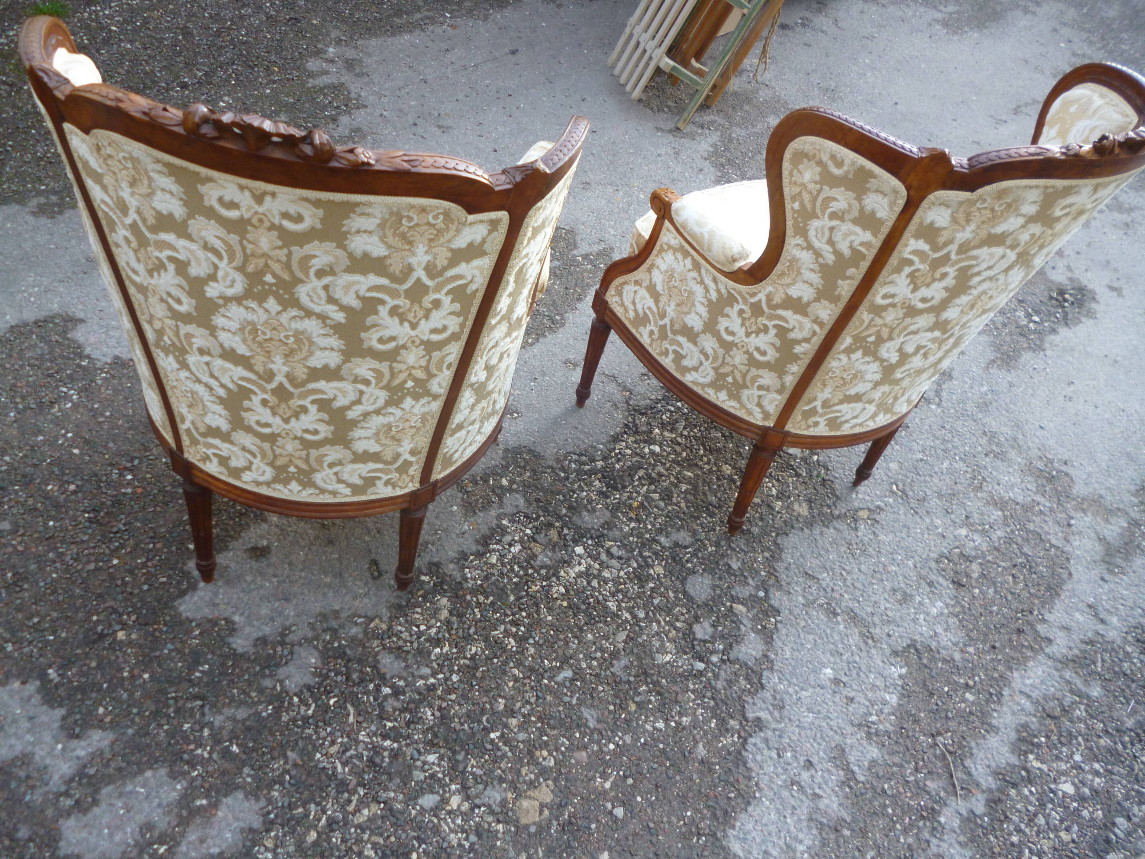 Pair of Louis XVI style armchairs with ears