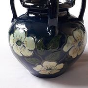 Antique art nouveau vase with floral decoration