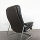 Stressless armchair and ottoman in leather from the 1970s.