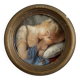 19th century miniature of a young girl with her head resting on a cushion
