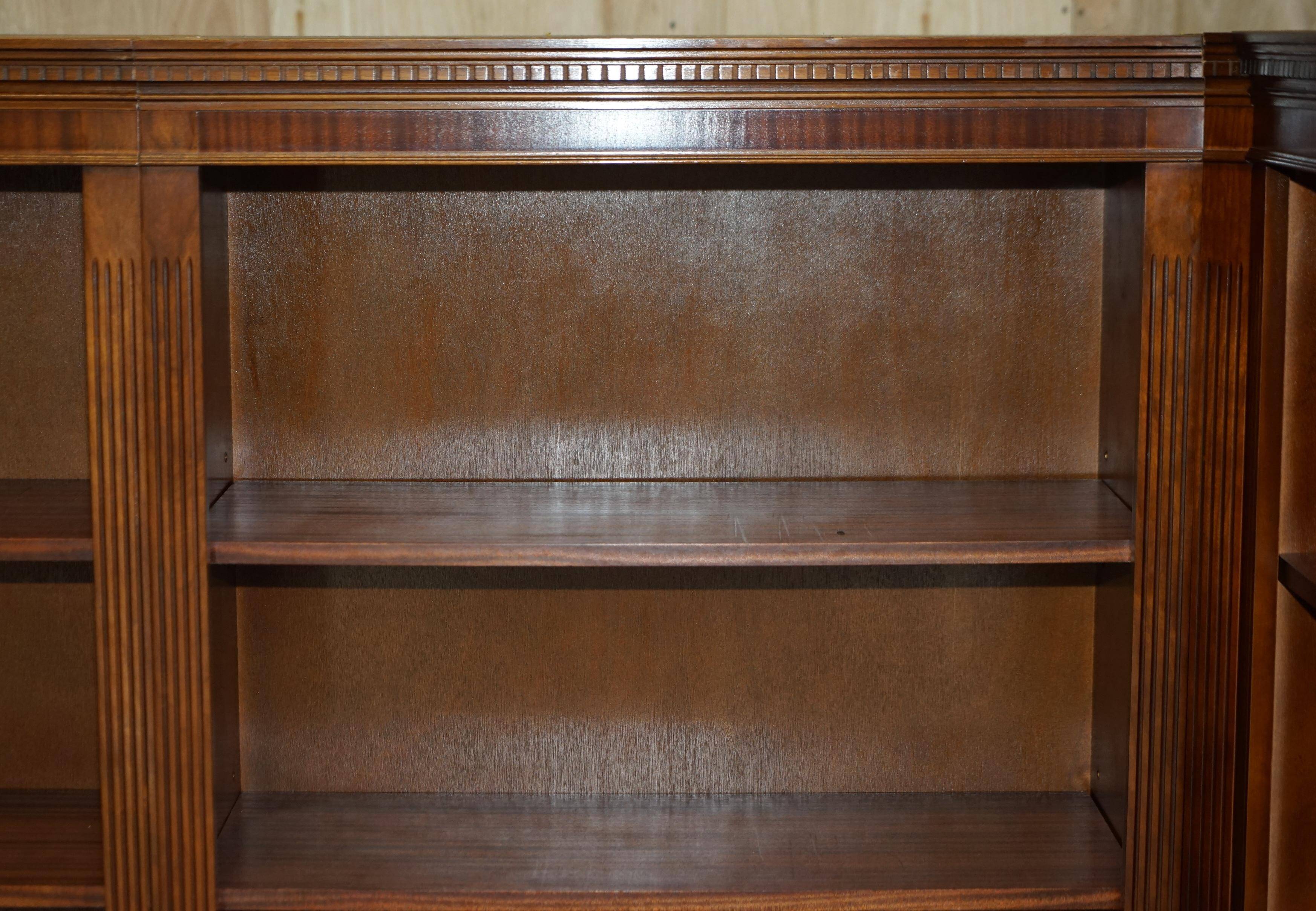 Corner library made of flamed hardwood, in 3 parts.