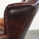 Comfortable cowhide wingback armchair in English style