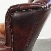 Fauteuil à oreilles en cuir de vache confortable dans le style anglais