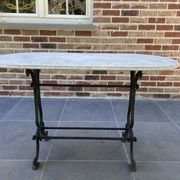 Art Nouveau cast iron and marble bistro table.
