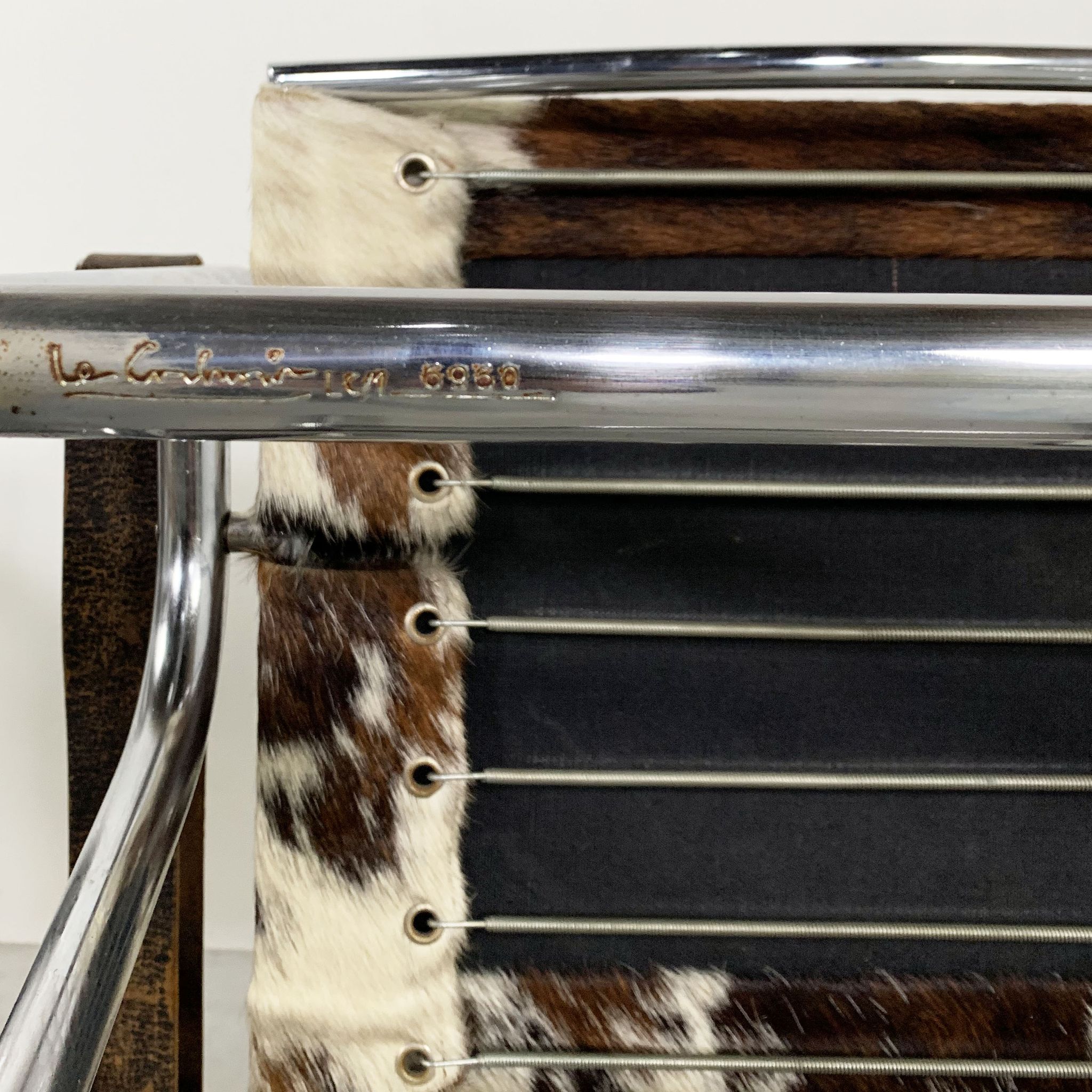 Pair of LC1 cow skin chairs by Le Corbusier for Cassina 1970