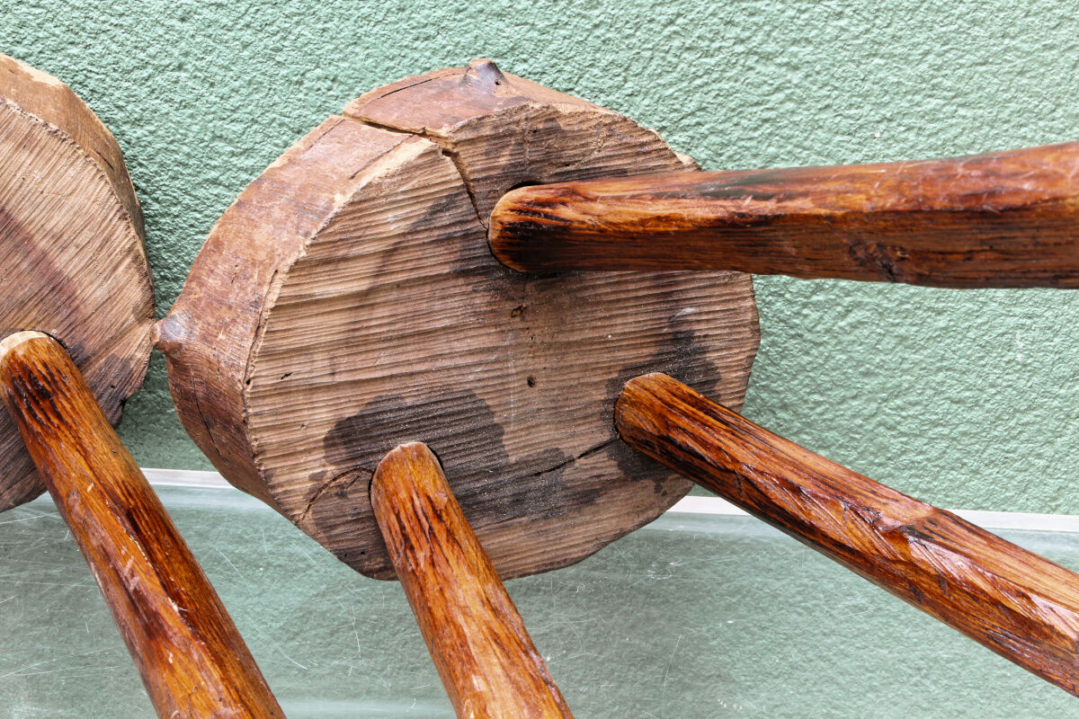 Pair of brutalist stools, tripods