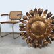 Large mid-century sunburst ceiling lamp, gilded metal with floral motif, 1950s