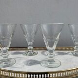 4 glasses of moulded pressed glass wine on foot
