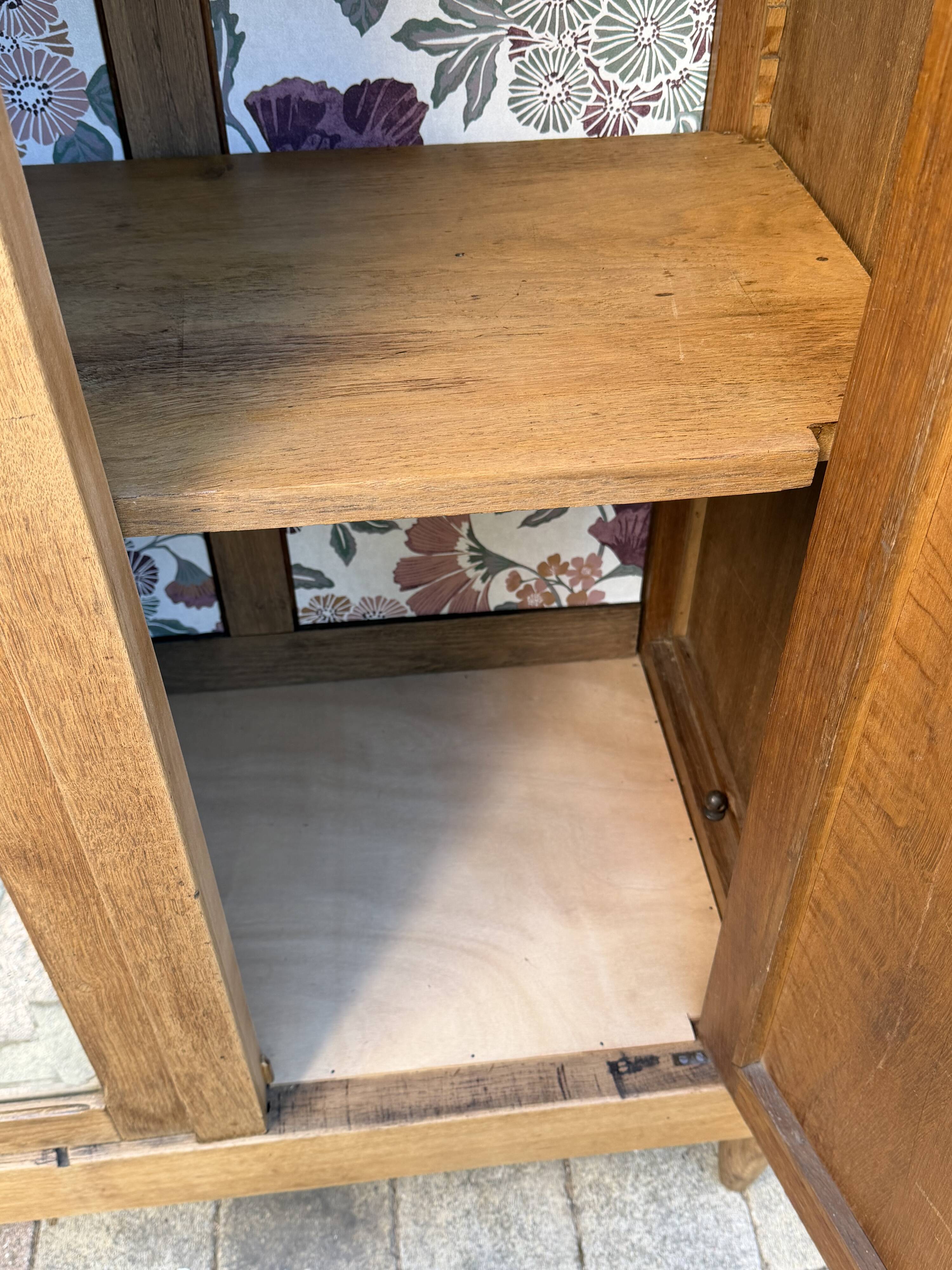 Art deco wardrobe in raw oak with bevelled mirror.