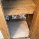 Art deco wardrobe in raw oak with bevelled mirror.