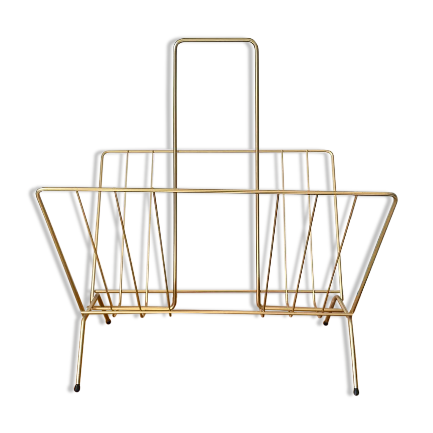 Vintage golden magazine rack