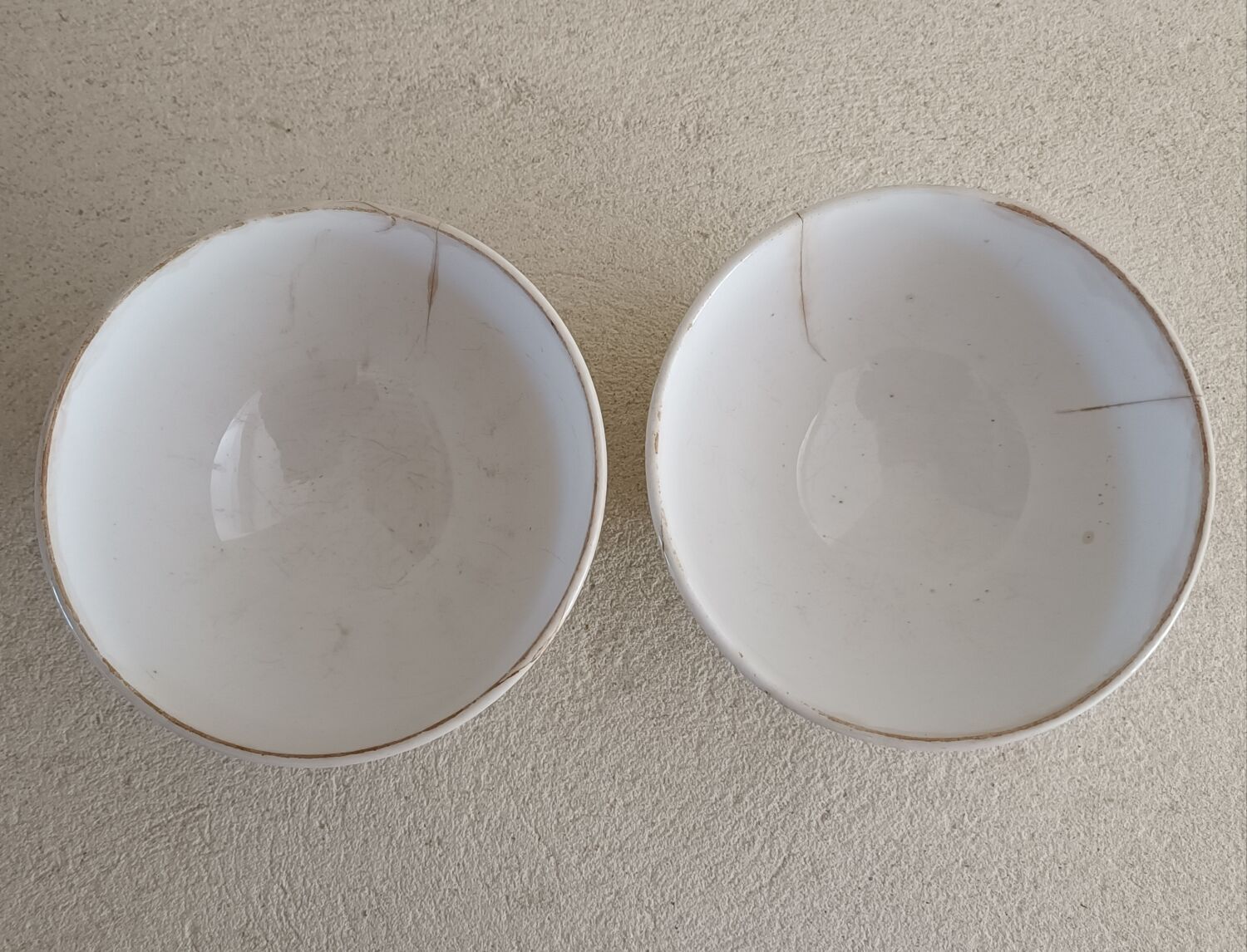 2 faceted iron earth bowls