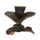 Patinated green brass candlestick with foliage decoration.