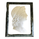 Profile of a young man in the style of antique marble.