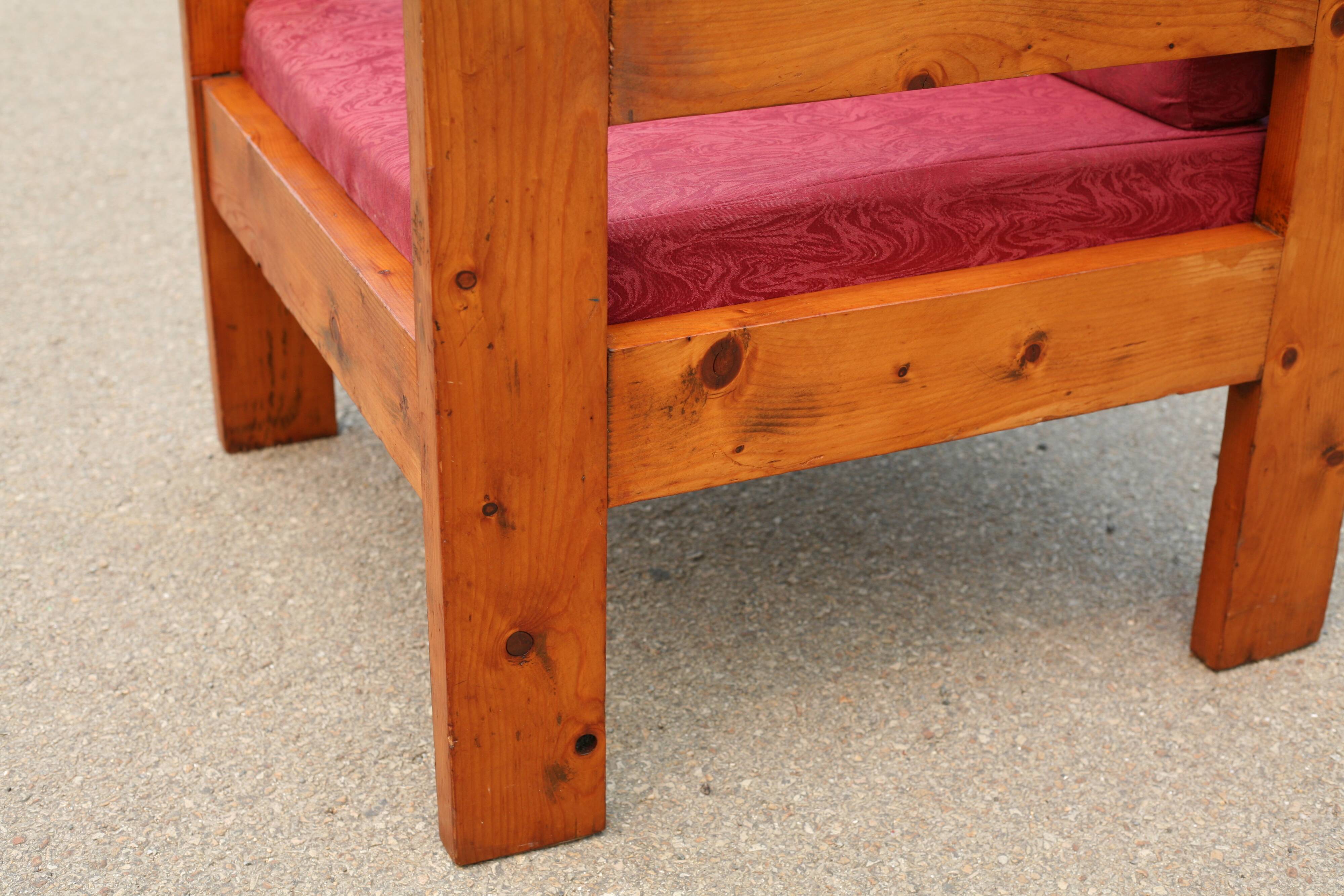 Pair of pine fireside chairs, France, 1960s, "raspberry" cushions