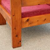 Pair of pine fireside chairs, France, 1960s, "raspberry" cushions